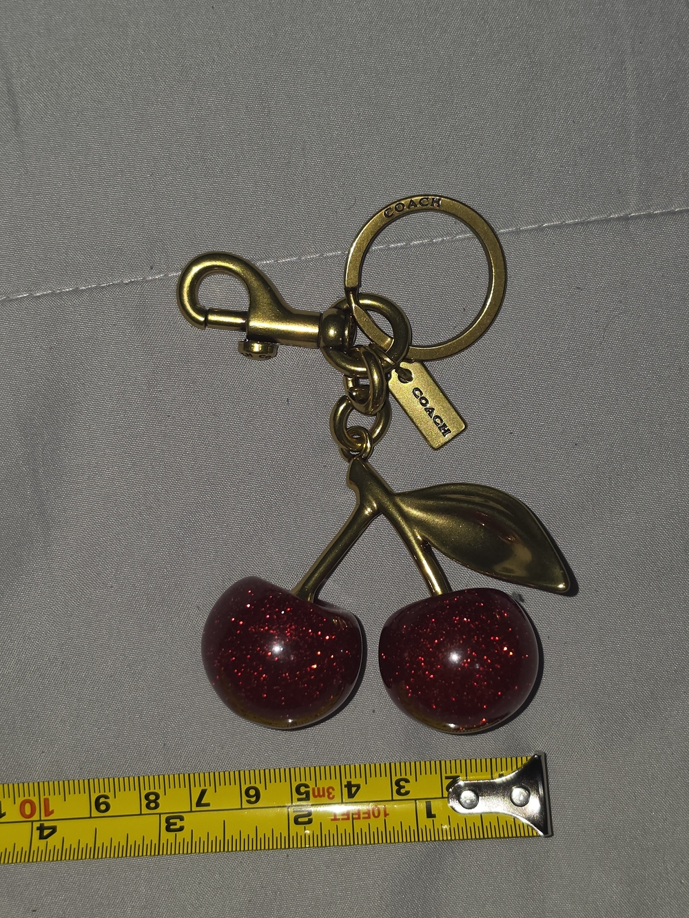Coach Gold-Tone Cherry Key Charm with Red Glitter Cherries